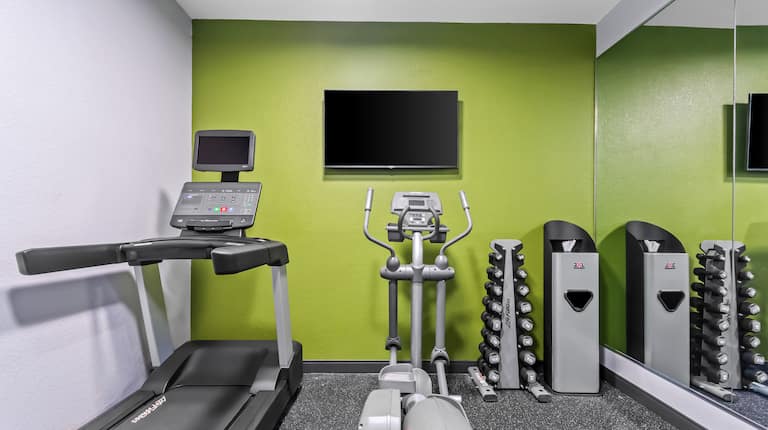 Fitness center with cardio equipment and free weights